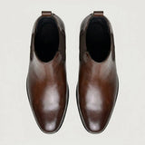 Par de botas Chelsea Nobre marrons visto de cima.