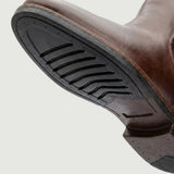 Detalhe do solado e do salto da Bota Chelsea Masculina Milan marrom.
