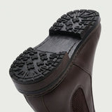 Detalhe do solado e do salto da Bota Chelsea Masculina Sítio marrom.