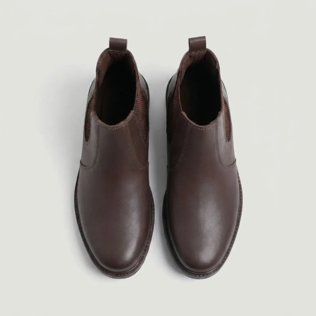 Par de botas Chelsea Sítio marrons visto de cima.