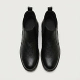 Par de botas Chelsea Vitiello pretas visto de cima.