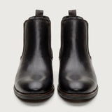 Par de botas Chelsea Londres pretas visto de frente.