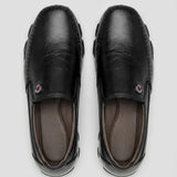 Par do modelo Mocassim Casual Comfort Daytona Drive, na cor preto, visto de cima.